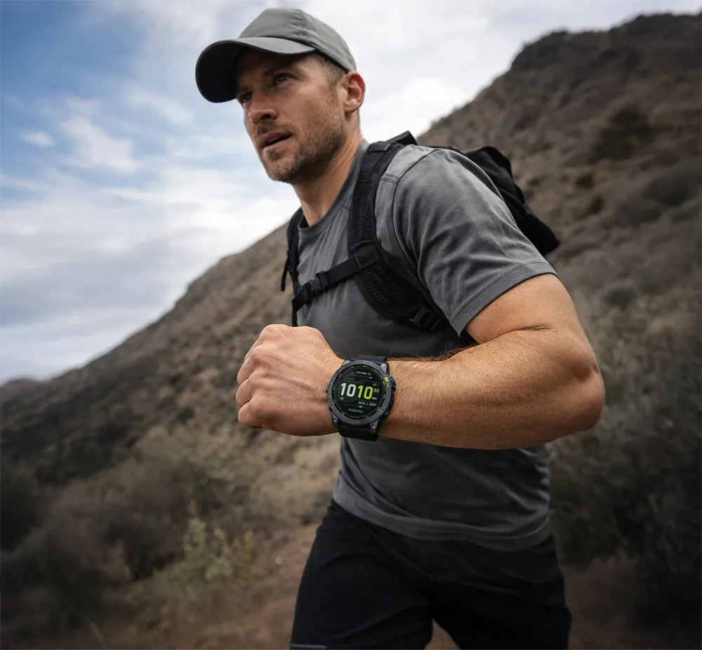 trail runner wearing garmin enduro 2